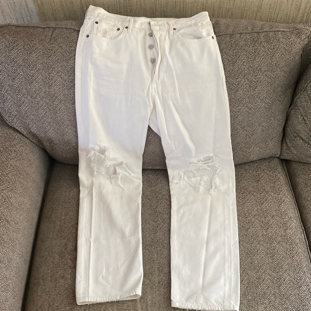 White straight leg ripped jeans.